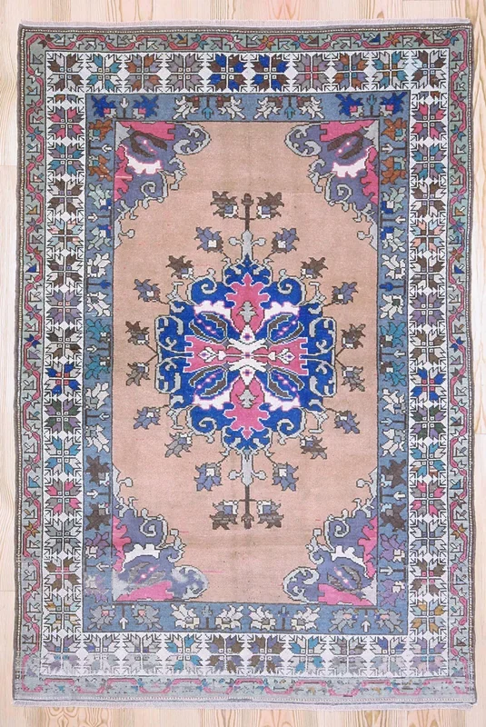5×7 Vintage Central Anatolian ‘Konya’ Turkish Area Rug | Navy medallion with pink accents spacious field | SKU 393