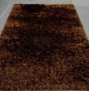 5′ x 7′ Brown Area Rug