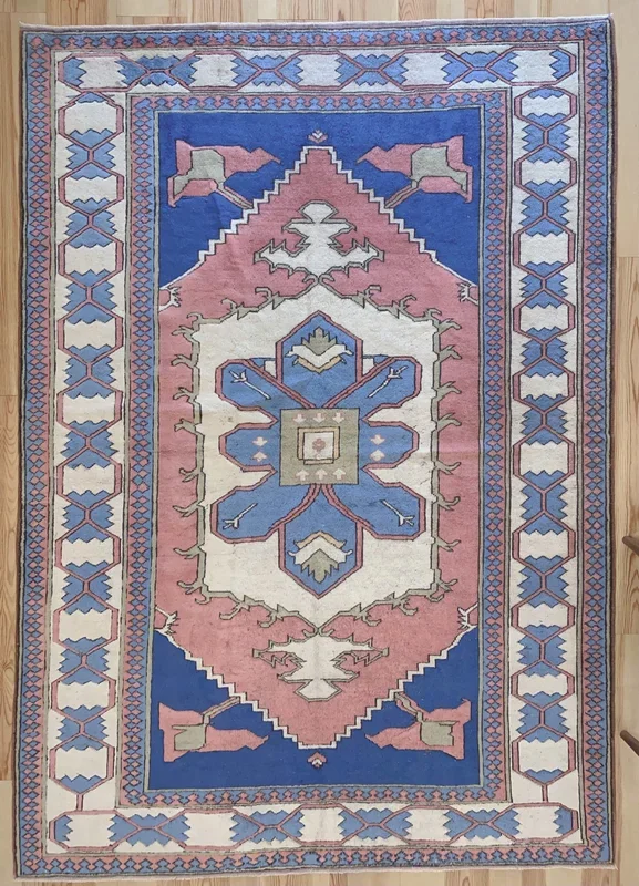 7×10 Vintage Central Anatolian ‘Sultanhan’ Turkish Area Rug | Bold Large Medallion on Spacious Field Simple Design Geometric Corners Stylized Border | SKU 647