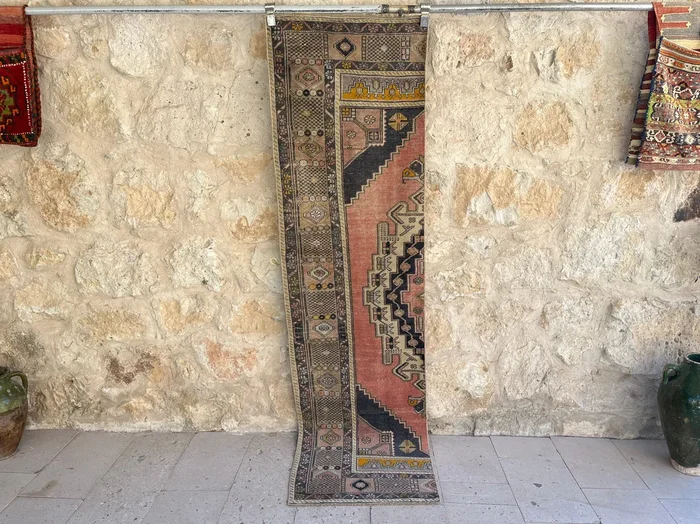 Isra 2’1” x 7’10”