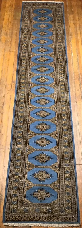 Jaldar Bokhara Rug. 12’ x 2’.6”